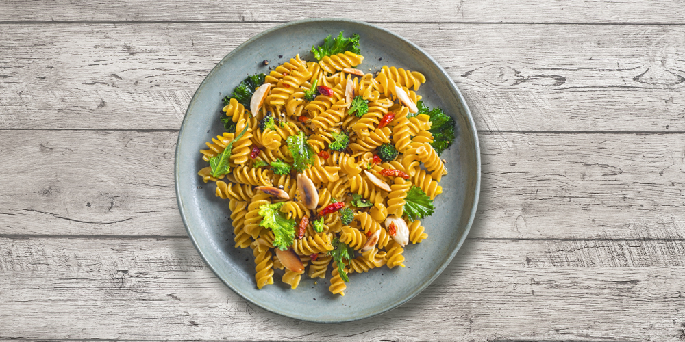 100% organic chickpea Fusilli with turnip greens, dried tomatoes and almonds