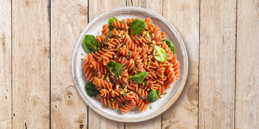 100% Organic red lentil Fusilli with pistachio granules, baby spinach and pink salt