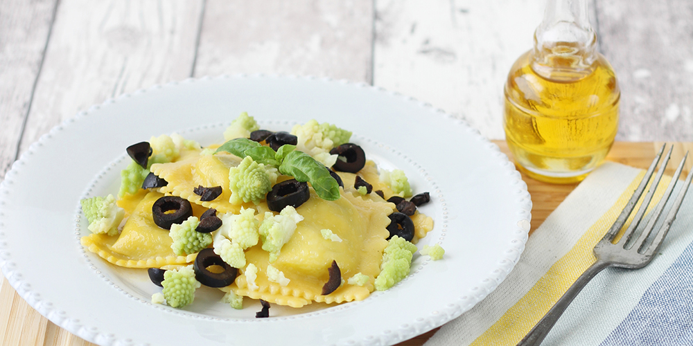 Gluten-free ricotta and spinach Raviolini with Romanesco broccoli and olives