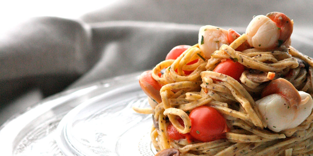 Tagliolini al tartufo con capesante e champignons