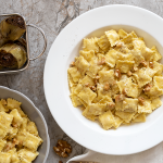 Small Ravioli with cheeses with artichokes and walnuts sauce