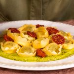 Tortellini filled Ricotta and Spinach with avocado cream and cherry tomatoes confit