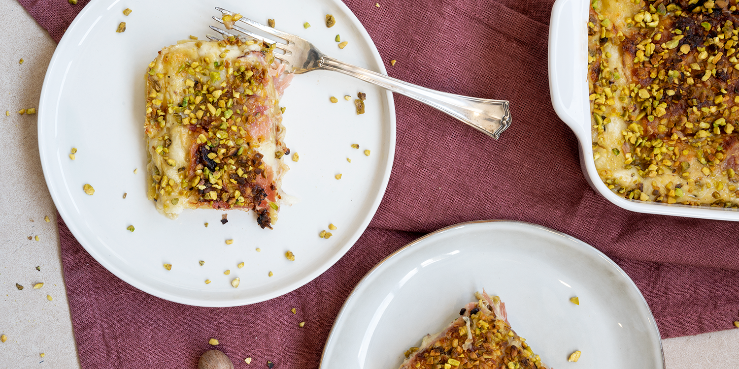 Lasagne al pistacchio e speck con scamorza dolce filante